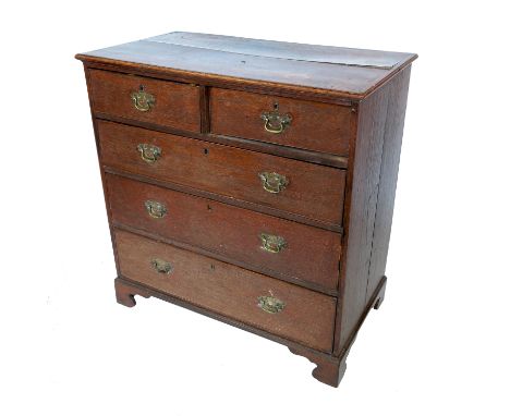 A Georgian oak chest of drawers, having two short over three long drawers, raised on bracket feet, height 39.25ins, width 38i