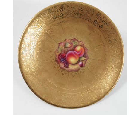 A Royal Worcester acid gilt plate, decorated with blackberries and peaches to the centre by Christopher Hughes, diameter 9.5i