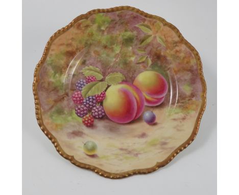 A Royal Worcester plate, decorated with hand painted fruit by Henry, diameter 7.75ins Condition report: Good condition