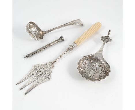 A Victorian silver sifting spoon, with bead edge, London 1862, weight 1oz, together with a Berthold Muller Dutch import silve