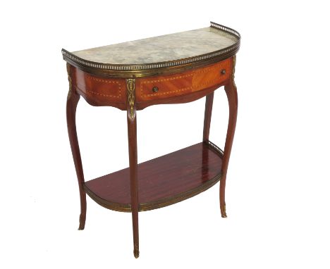 A continental side table, having marble top with gilt metal gallery and a frieze drawer, raised on slender cabriole legs unit