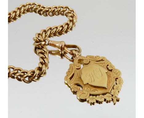 An 18 carat gold double watch chain, of solid curb links, with a swivel and bolt ring, 39cm long, with a fob medallion stampe