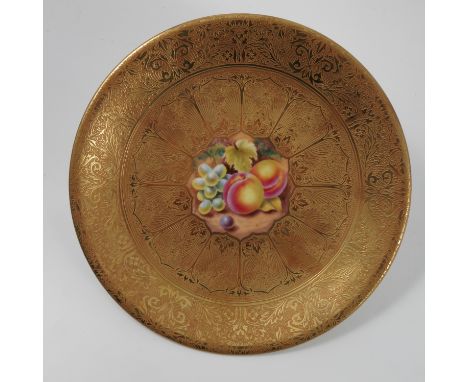 A Royal Worcester acid gilt plate, decorated with grapes and peaches to the centre by Henry, diameter 9.5ins Condition report