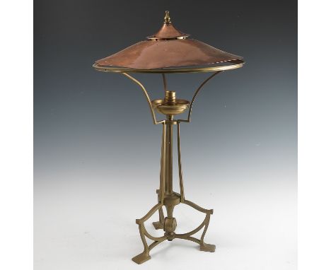 An Arts and Crafts copper and brass table lamp, not stamped but possibly Birmingham Guild of Handicraft, with copper domed sh