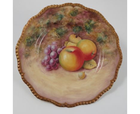 A Royal Worcester plate, decorated with hand painted fruit by Reed, diameter 7.75ins Condition report: Good condition