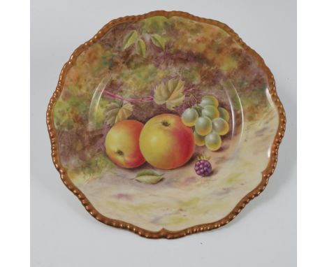 A Royal Worcester plate, decorated with hand painted fruit by Henry, diameter 7.75ins Condition report: Good condition