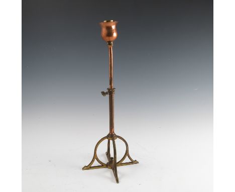 A Birmingham Guild of Handicraft copper and brass table lamp, the flower bud light holder supported on a telescopic column, t