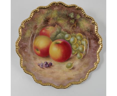 A Royal Worcester plate, with shaped border, decorated with fruit by Ayrton, dated 1955 diameter 8.75ins   Condition report: 