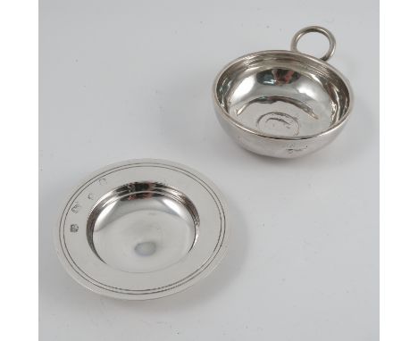 A 19th century French silver wine taster, of circular form with snake ring handle, weight 2oz, together with a hallmarked sil