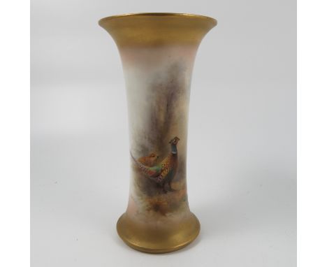 A Royal Worcester spill vase, decorated with pheasants in a glade by James Stinton, circa 1919, shape number G925, height 7.2