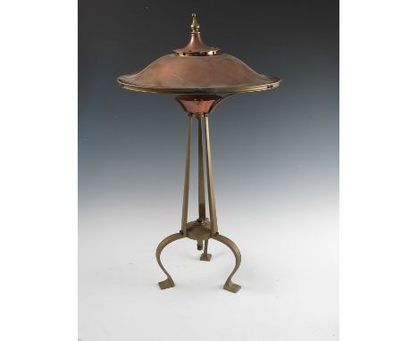 An Arts and Crafts copper and brass table lamp, not stamped but possibly Birmingham Guild of Handicraft, with copper domed sh