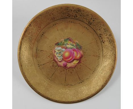 A Royal Worcester acid gilt plate, decorated with grapes and peaches to the centre by Henry, diameter 9.5ins Condition report