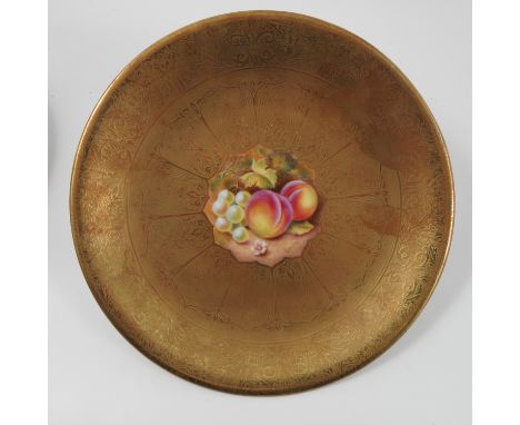A Royal Worcester acid gilt plate, decorated with grapes and peaches to the centre by Henry, diameter 9.5ins Condition report