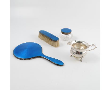 A silver and blue enamel dressing table hand mirror, together with matching brush and pot with glass base, Birmingham 1934, t