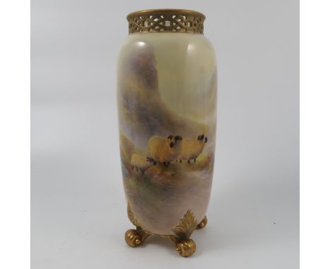 A Royal Worcester spill vase, decorated with sheep by a loch in a Highland landscape by Harry Davis, shaped umber G923, circa