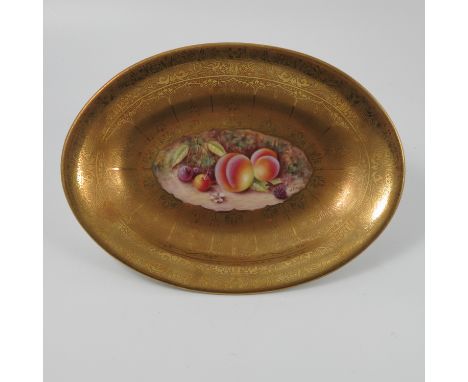 A Royal Worcester acid gilt oval dish, with cherries and peaches by Reed, maximum diameter 10.75ins Condition report: Good co