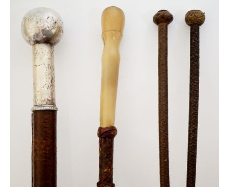 A collection of four 19th Century riding crops, one with silver coloured metal pommel and deep collar wit vacant cartouche an