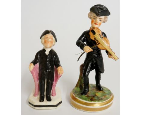 Two early 19th Century miniature figures - a gentleman wearing tricorn hat playing the violin wearing black coat and breeches