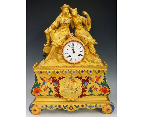 A mid 19th Century ormolu mantel clock of Chinoiserie design, the elaborate case with pair of figures on top of a rocky outcr