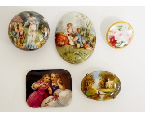 Three porcelain plaques, printed and painted, one mounted as a brooch; a printed and painted knob decorated with Snow White &