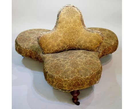 A Victorian conversation seat of conventional triple design on turned legs fitted ceramic castors, 116cm wide, 76cm high, Cir