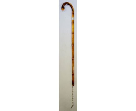 A Brigg of London bamboo walking stick, rootball crook handle, silver collar hall marked , also stamped H.Garrad Buck's Club 