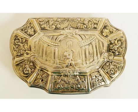 A Continental D-shaped silver coloured metal snuff box the hinged lid with central panel cast cherub amidst colonnaded interi