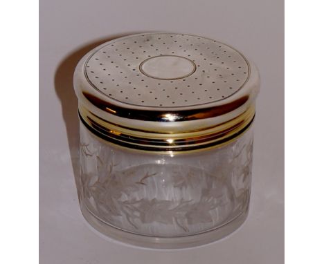 Asprey & Co - a silver dressing table jar of cylindrical design the glass body wheel engraved with bees and trailing vines, t