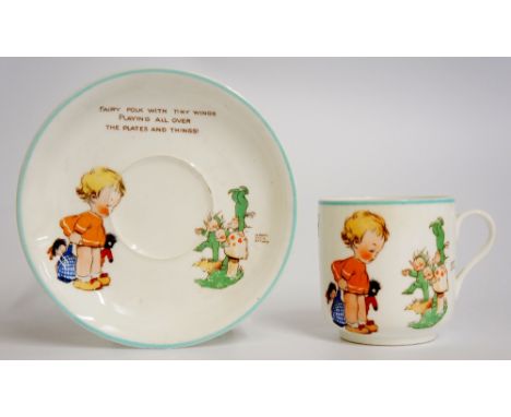 Mabel Lucie Attwell - a nursery cup & saucer inscribed "Fairy folk with tiny wings playing all over the plates and things!", 