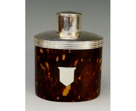 A Victorian silver mounted oblong tortoiseshell tea caddy and cover, plain reeded neck, the body mounted with plain shaped ca