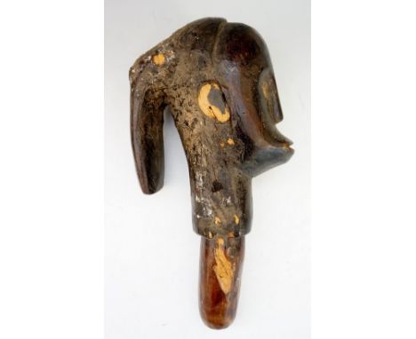 An African Byeri tribal reliquary head, with "button" eyes and protruding lips, possibly 19th Century, 30cm high (faults)