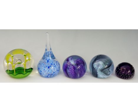A collection of paperweights, Caithness 'May Dance' in green, Caithness 'Whispers' in blue, Caithness 'Trapeze' in black and 