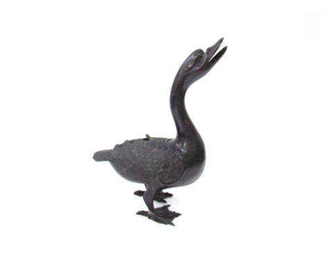 A Japanese Meiji period archaic style bronze ‘duck’ censer and cover, 35cm tall 