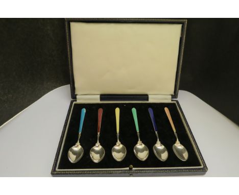 A Cohen &amp; Charles set of six silver and enamel coffee spoons with different coloured handles (one with slight damage), Bi