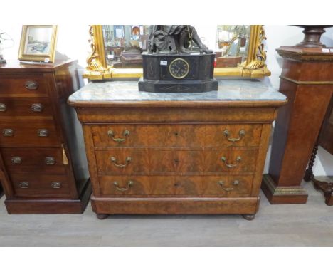 A 19th Century flame walnut Louis Phillippe commode, marble top over cushion drawer, three long drawers, concealed plinth dra