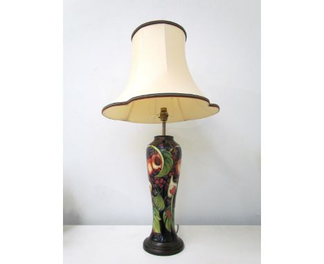 A Moorcroft lamp in the "Peaches" pattern, the ceramic base, 37cm high 