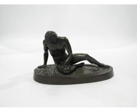 A late 19th Century Grand tour souvenir bronze figure "The Dying Gaul", 8cm tall x 16cm long 