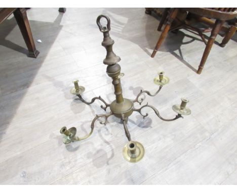 A 19th Century Jewish heavy brass ceiling chandelier with six sconces, scrolled detail 