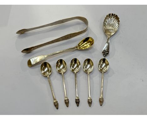 A Hampton utilities silver tea caddy spoon, Birmingham 1964, pair of Peter and Ann Bateman sugar tongs, London 1792. Five Tho