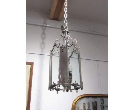 A hall lantern of large proportions with glass and chrome/silvered panels, four bulb, 67cm tall 
