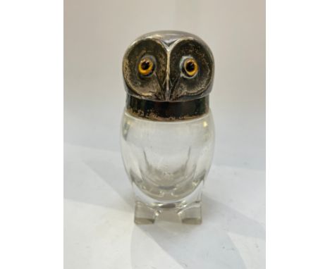 A William Hutton &amp; Sons Ltd silver lidded vessel, the lid as an owl's head, glass amber bead eyes, London 1896, some dama