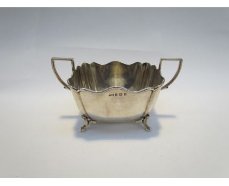 A Charles Westwood and Sons silver twin handled sucrier, raised on four swept feet, Birmingham 1907, 280g 