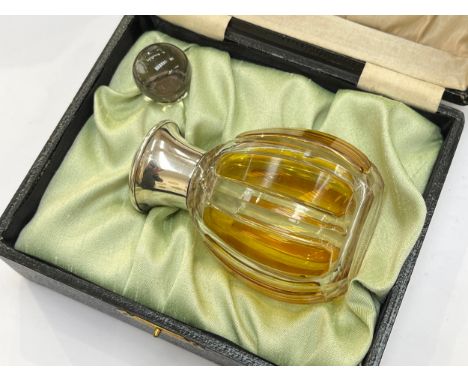 An amber and clear glass scent bottle with sterling silver collar, glass stopper, 11cm tall 