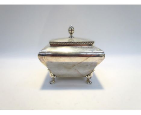 A Frederick Augustus Burridge silver trinket box / tea caddy of sarcophagus form, gadrooned rim, raised on paw feet, 10.5cm x
