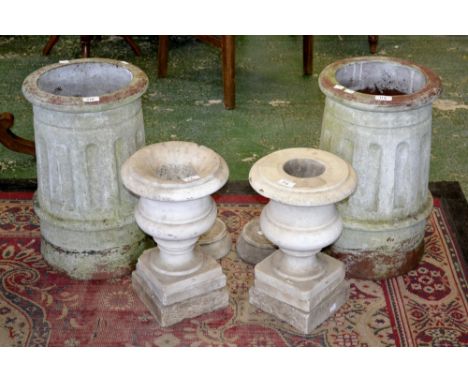 Architectural salvage - Two circular chimney pots with fluted sides, circa 1920. 50cm high x 32cm diameter; two compressed ca