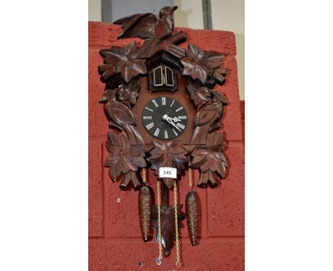 A modern cuckoo clock with battery powered movement.