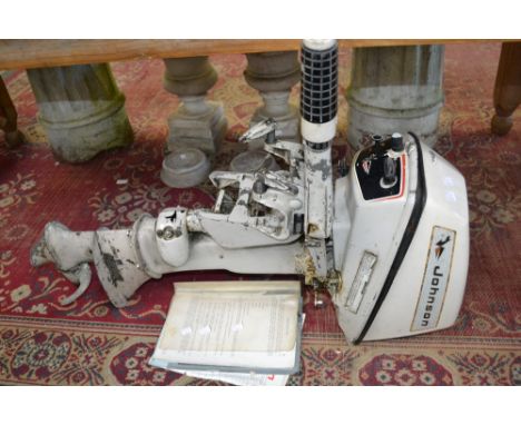 A Johnson 6HP Seahorse outboard motor with leaflet, etc.