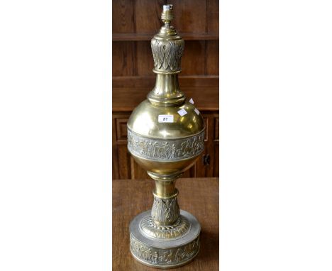 A large Grecian brass lamp