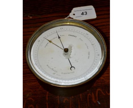 A Victorian brass cased holosteric barometer