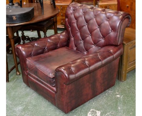 A modern executive office button back armchair.